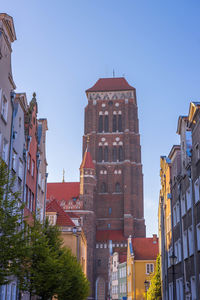 Low angle view of buildings against clear sky