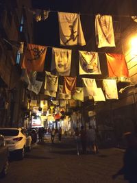 Group of people in market at night