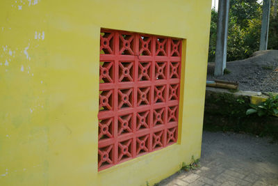 Closed door of yellow building