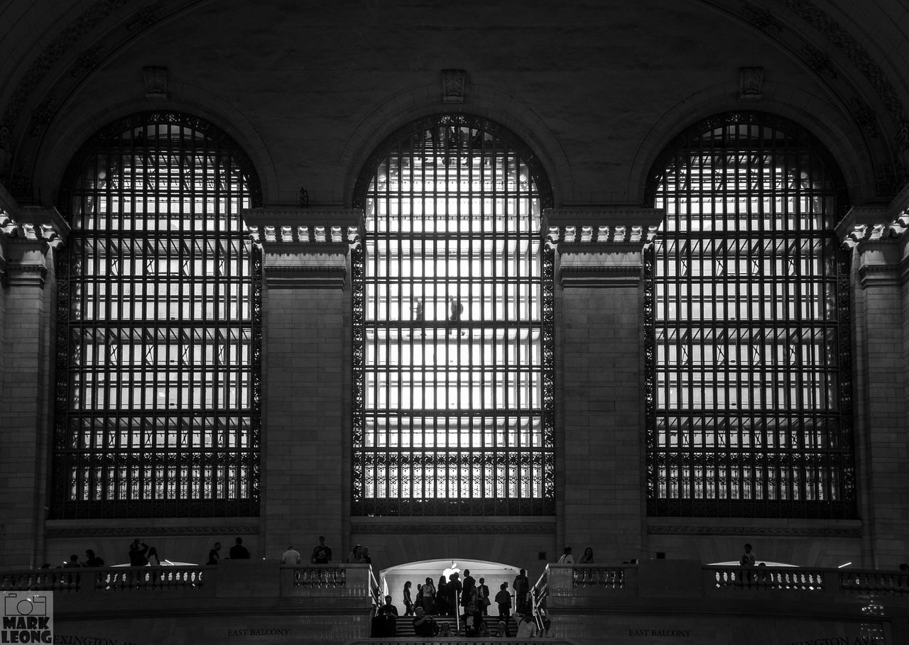 arch, architecture, built structure, indoors, architectural column, window, person, lifestyles, men, building exterior, history, leisure activity, famous place, column, entrance, travel destinations, building, tourism, travel