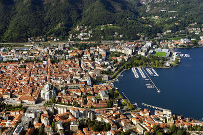 High angle view of sea along built structures