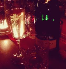 Close-up of wine in glass on table