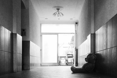 Man sitting in corridor