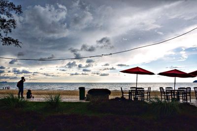 Scenic view of sea against cloudy sky