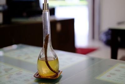 Close-up of glasses on table