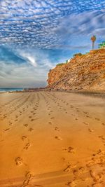 Scenic view of beach against sky