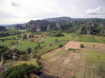 Aerial view of mountain village boklua tuck away in the mist of doi phuka mountain