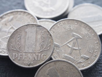 Close-up of one deutsche mark coins on table