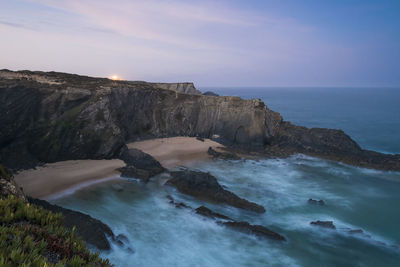 Scenic view of sea against sky during sunset