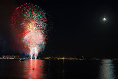 Firework display at night