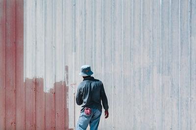 Man painting wall