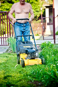 Man standing in lawn
