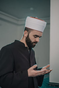 Young man using mobile phone