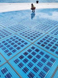 Full length of man swimming in pool