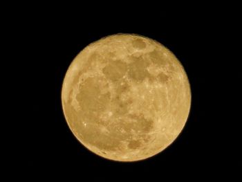 Close-up of moon against clear sky at night