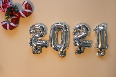 High angle view of decoration on table against wall