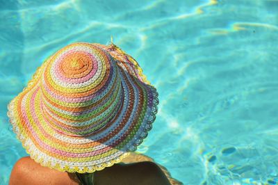 Close-up of person wearing hat in swimming pool