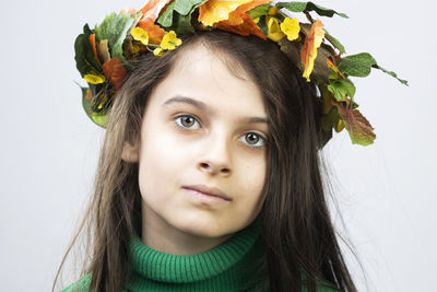 Portrait of a girl 7 years old on a white background