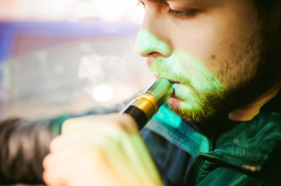 Man smoking electronic cigarette