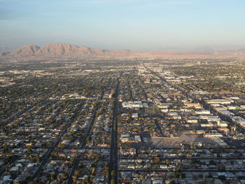 Aerial view of cityscape against sky