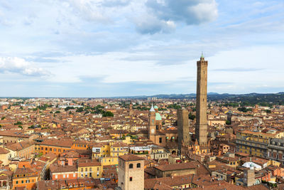 Aerial view of townscape against sky