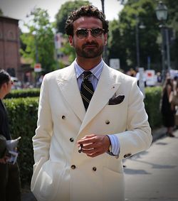 Man wearing sunglasses standing outdoors