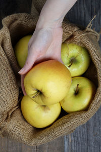 High angle view of apples in container