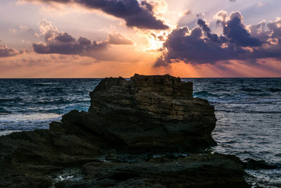 Scenic view of sea against sky during sunset