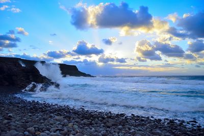 Scenic view of sea against sky during sunset