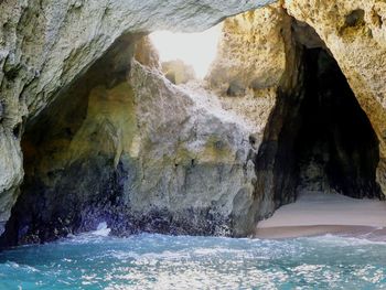 Scenic view of rock formation in sea