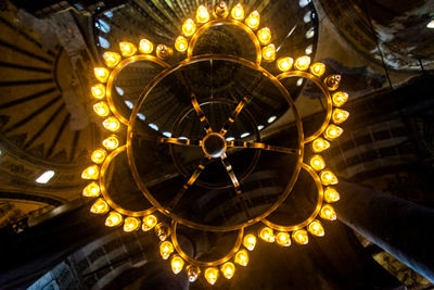 Low angle view of illuminated chandelier