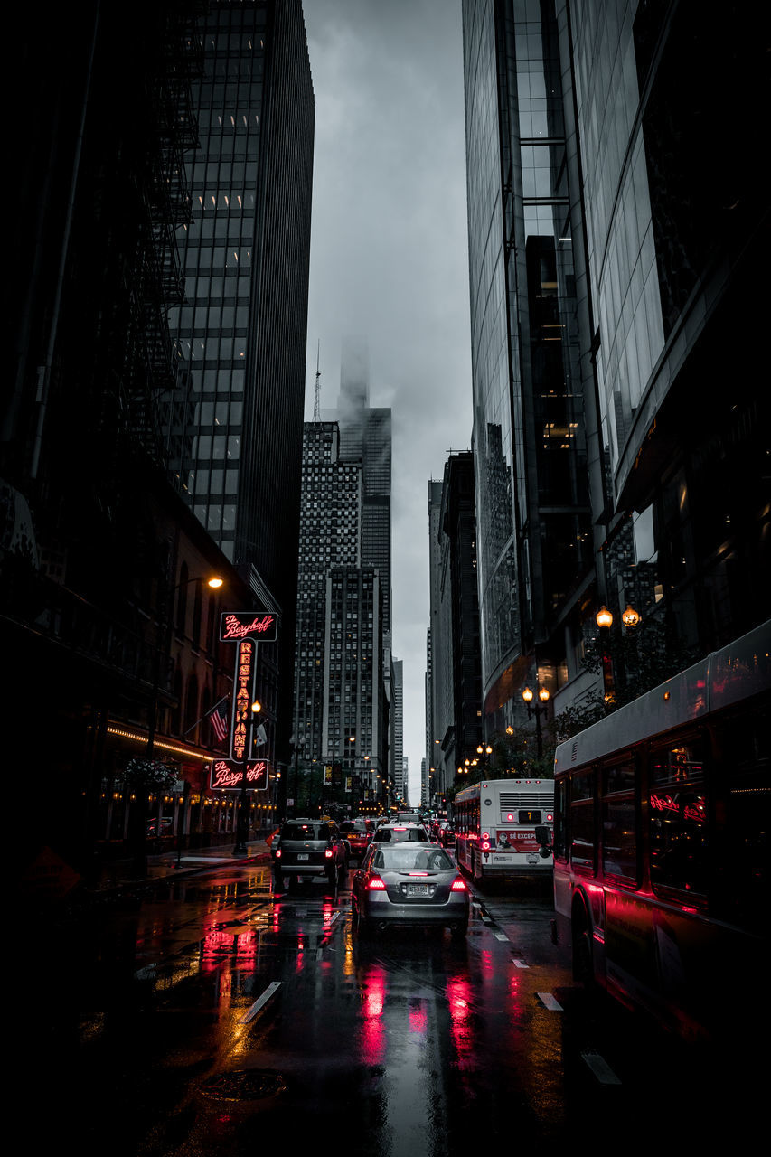 VIEW OF CITY STREET AT NIGHT