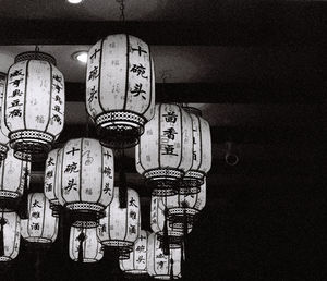 Low angle view of lantern hanging on ceiling