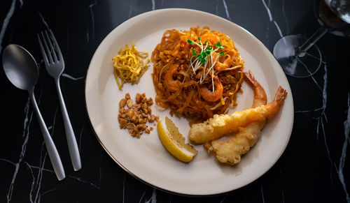 High angle view of pasta in plate on table