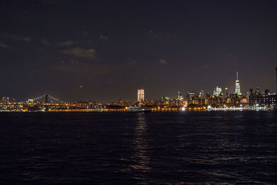 Illuminated buildings in city at night