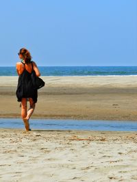 People standing on beach