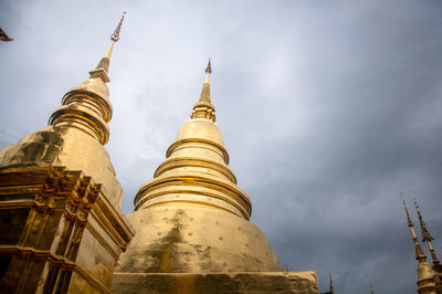 Low angle view of cathedral against cloudy sky