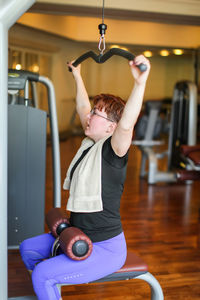 Woman exercising in gym