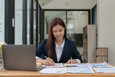 Businesswoman working at office