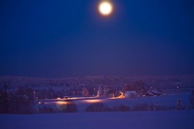 View of illuminated landscape against clear sky