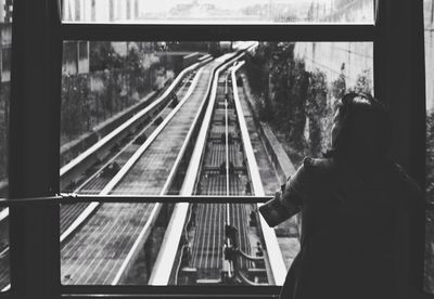 Rear view of man train at railroad station