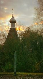 Built structure against sky during sunset