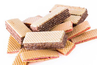 Close-up of cake against white background