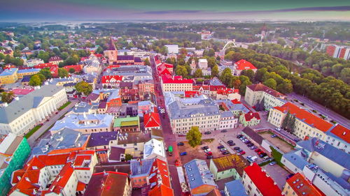 High angle view of city buildings against sky