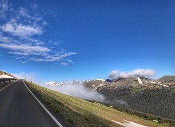 Landscape of trail ridge road, mountains, sunshine and a few clouds at rocky mountain national park 