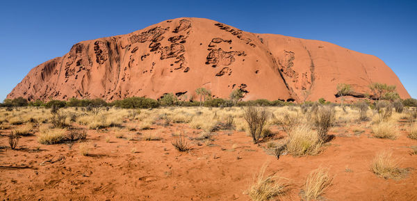 Scenic view of desert against clear sky