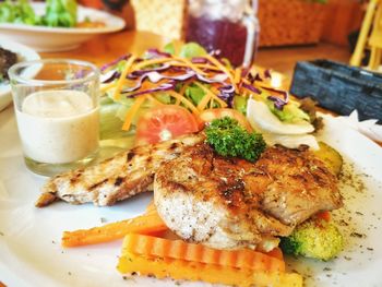 Close-up of food served on table