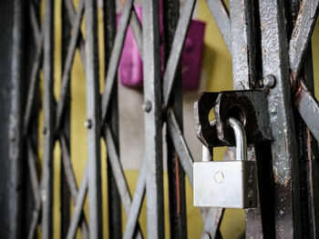 Close-up of padlocks on railing