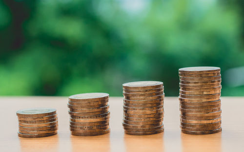 Stack of coins on table