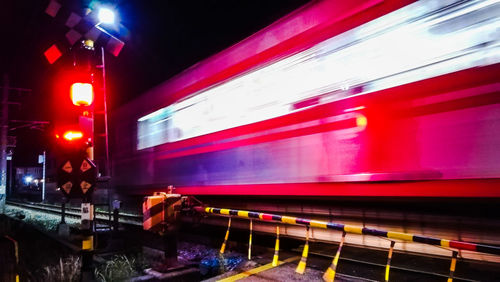 Train at railroad station at night